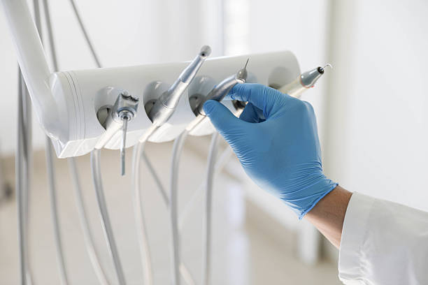 Professional Tooth Extraction technician working in Kennesaw, GA